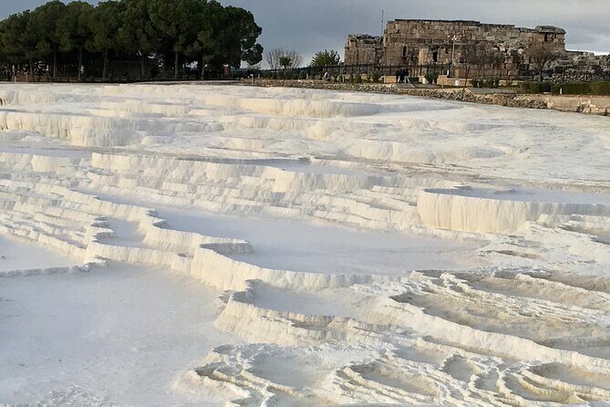 Full Day Pamukkale Terraces and Hierapolis Ruins Tour - Hierapolis ruins: Roman baths, Necropolis, and the Temple of Apollo