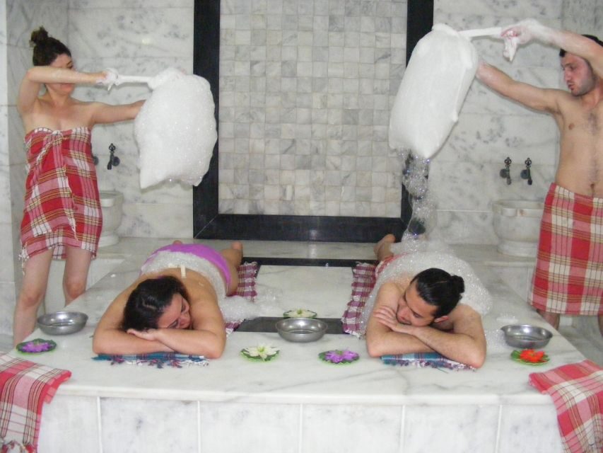 Kusadasi Turkish Bath - Peeling on hot belly stone: loofas, pores, and what to expect